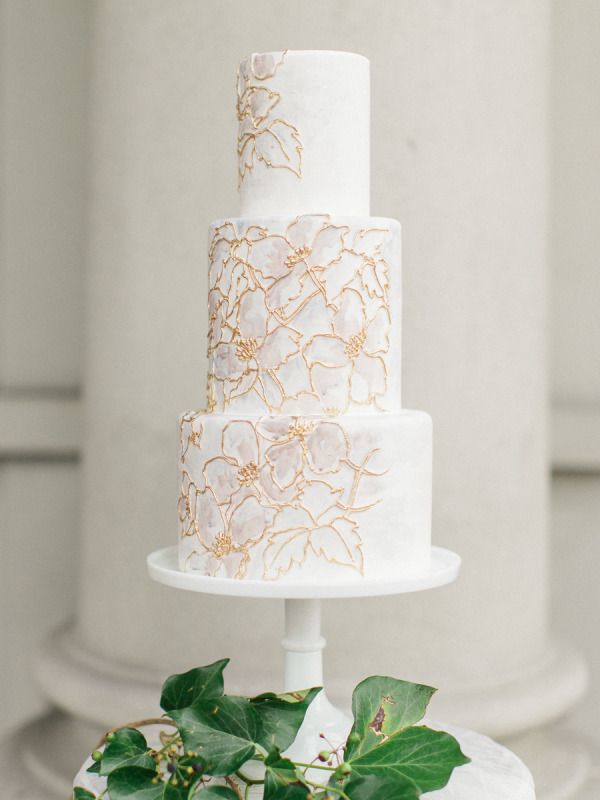Watercolor flowers detailed wedding cake with gold