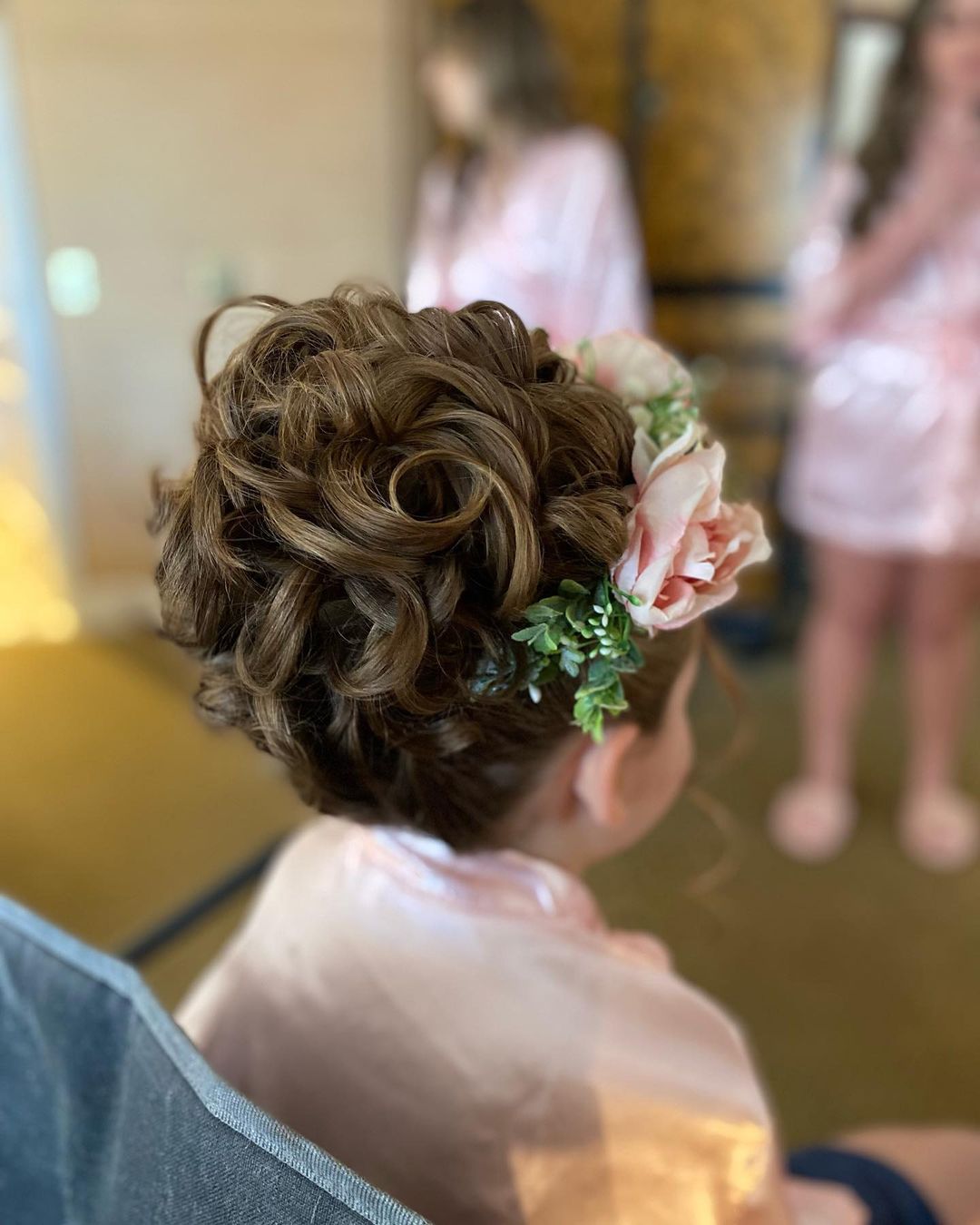 flower girl hairstyle curly updo for little girl