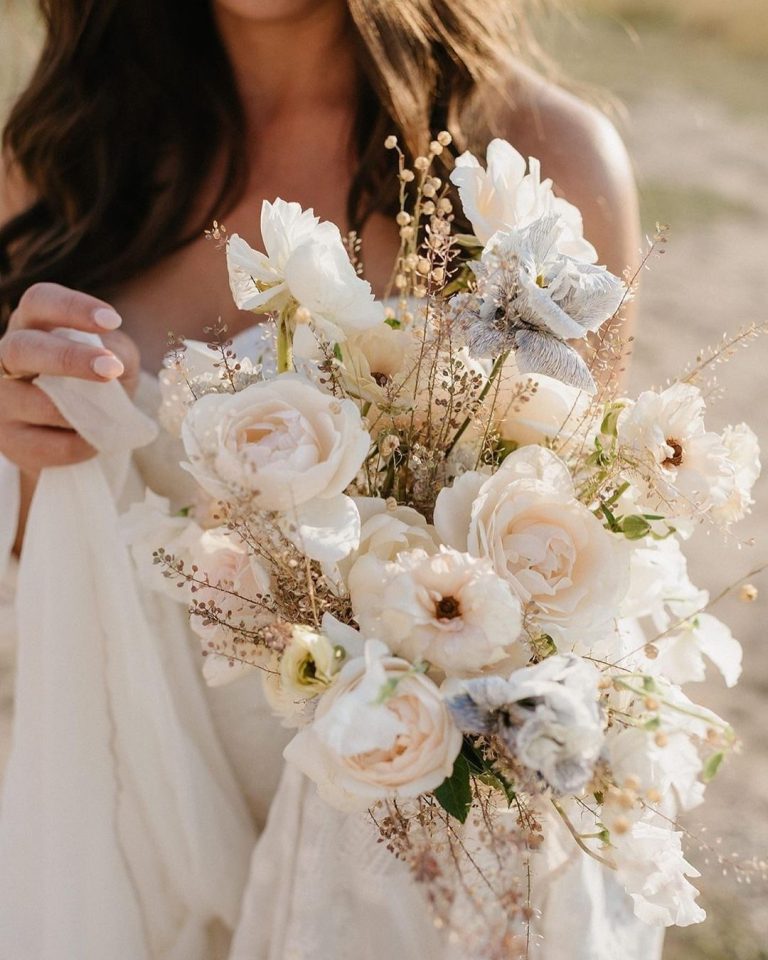 Average Cost Of Wedding Flowers Guide Tips 2023   How Much Do Flowers Cost For A Wedding White Wedding Bouquet 768x960 