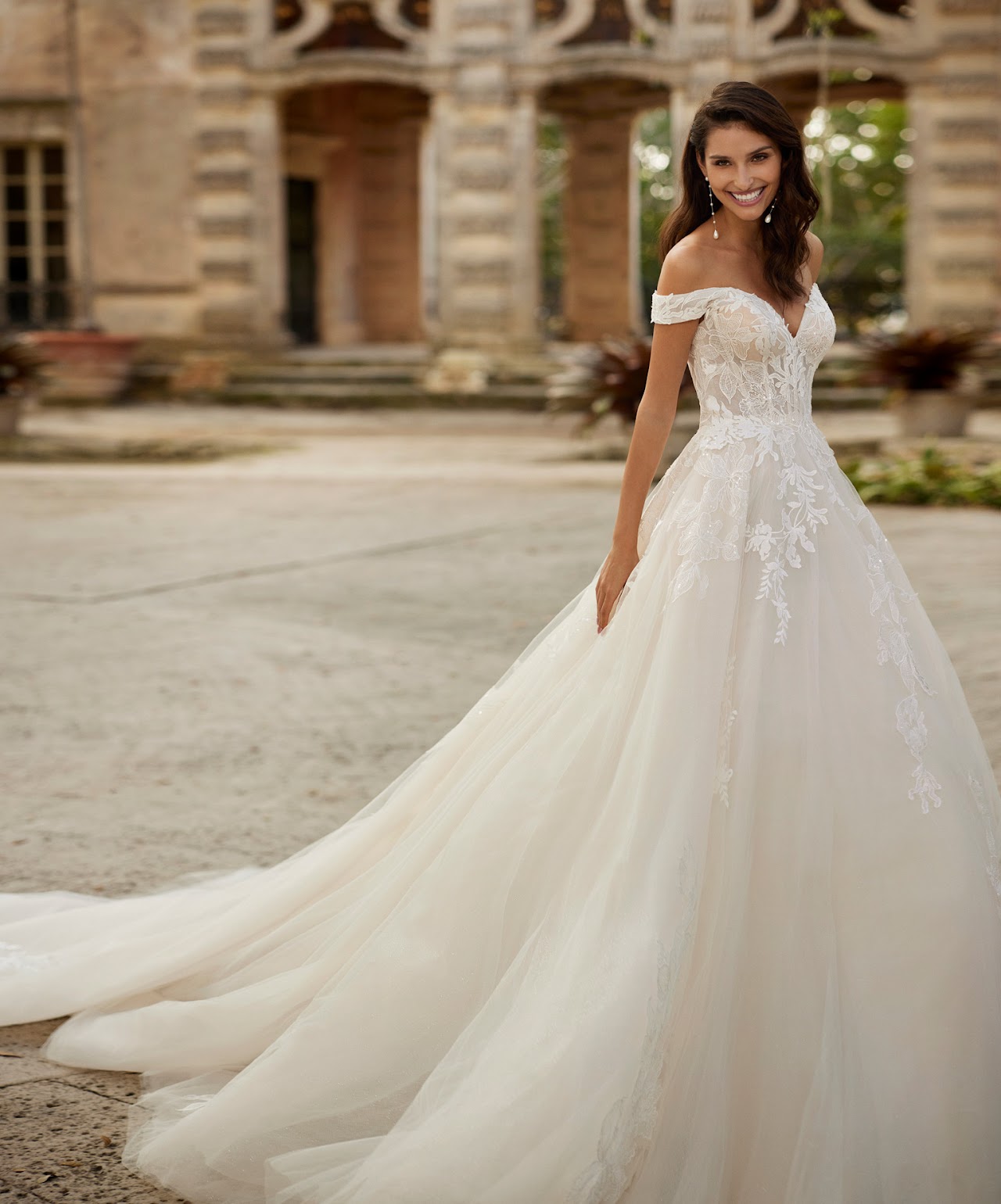 off the shoulder sweetheart wedding gown